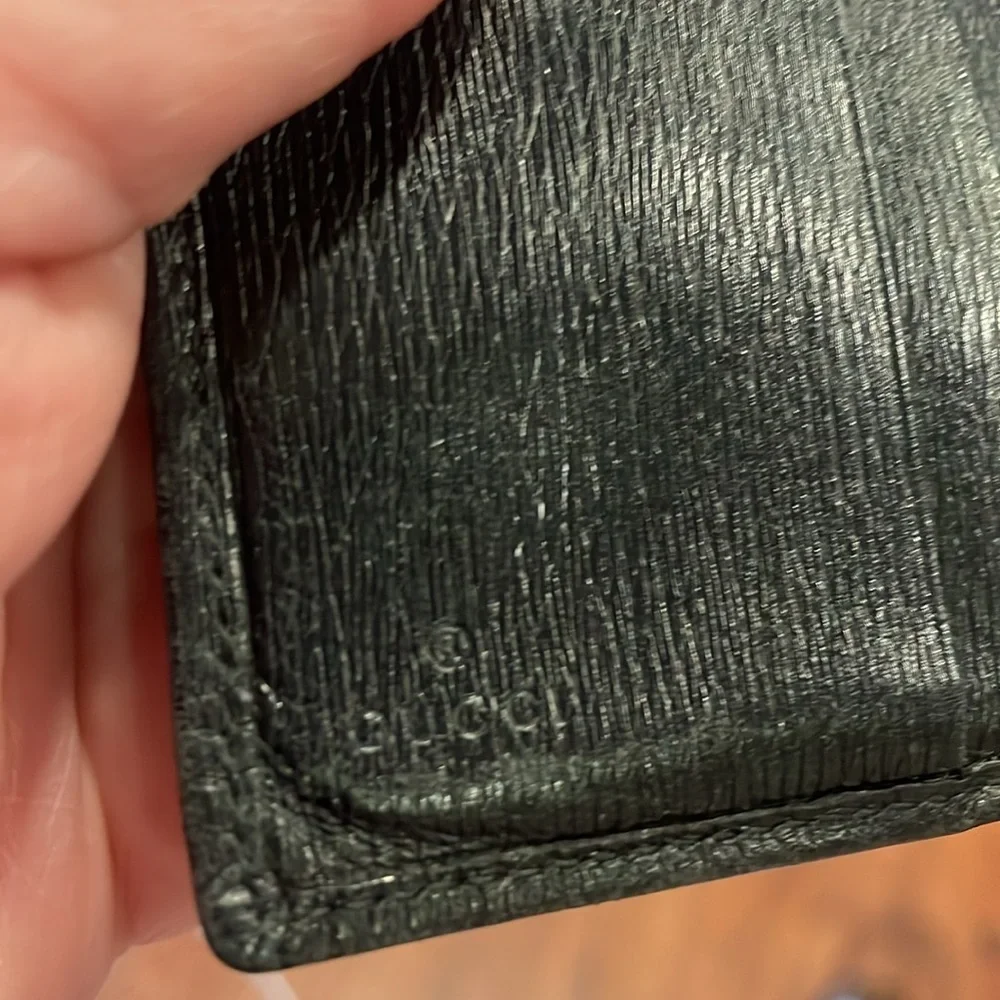Gucci black leather (unisex) wallet. Snap in front for cards/cash back coin WLT